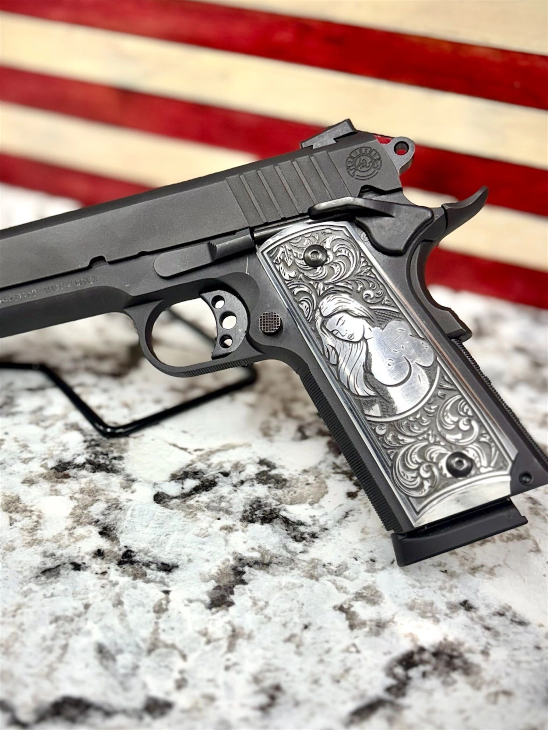 Custom engraved 1911 pistol with American flag